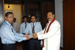 Mr S S P Mahanama handed over a free copy of Mahanamas Sinhala Word Processor to Mr Mahinda Rajapaksa at the Parliament Premise on the 06th July 2005