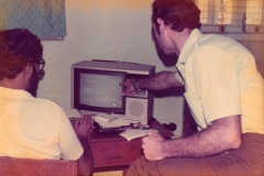 Dr Roger Stern of the University of Reading (r) and Buddy Liyanage of the University of Colombo developing the election software on the BBC Micro computer. Note the computer display is a TV.