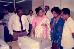 Nayeni Fernando demonstrating the cheque encoders to senior Central Bank staff