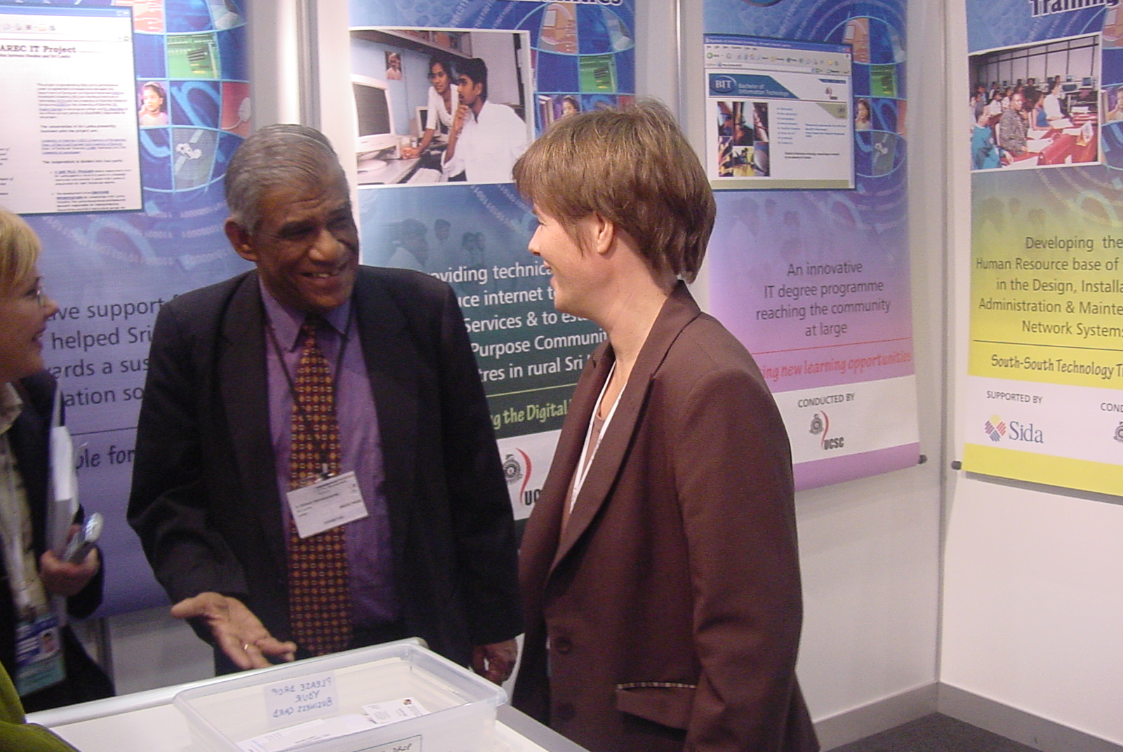 With Minister of International Development, Sweden at the UCSC stall, World Summit on Information Society WSIS, Geneva 2003