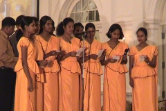 Members of the musical group of the University of Colombo Arts Council sing the Felicitation song composed by Kamal Waleboda at the Felicitation to Prof. Samaranayake held in December 2004. Prof Samaranayake is a former Chairman of the Arts Counci