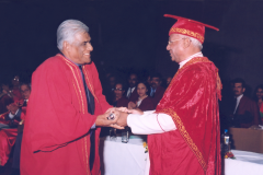 Prof. Samaranayake receiving the degree of D.Sc. ( Honoris Causa ) from Most Rev Bishop Oswald Gomis, Chacellor of the University of Colombo at the 2004 convocation held in January 2005